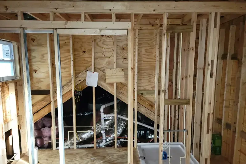 Plumber tools on wooden background top view.